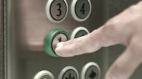 Man presses a button the first floor in an elevator Vidéo 51468502