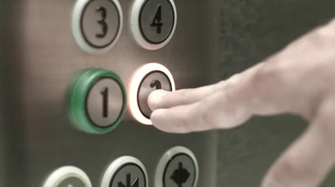 Man presses a button the second floor in an elevator Vidéo 51468155