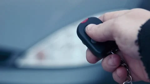 The man presses the button of the security alarm Stock Footage 100533238