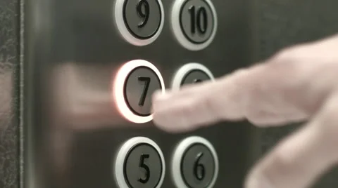 Man presses a button the seventh floor in an elevator Vidéo 51468484