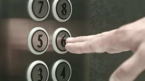 Man presses a button the sixth floor in an elevator Vidéo 51468535