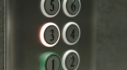 Man presses a button the third floor in an elevator Stock-Footage 51468187
