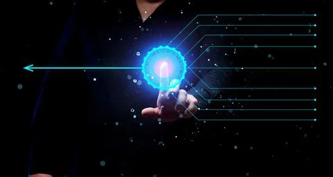 A man presses a button where many lines are connected into one. The concept o Stock Photos