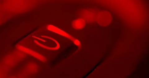 A man presses the computer's power button and the computer starts. then the man Stock Footage 126040097