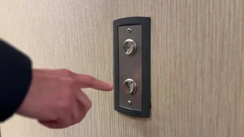 Man Presses Elevator Down Button Stock Footage 325453304