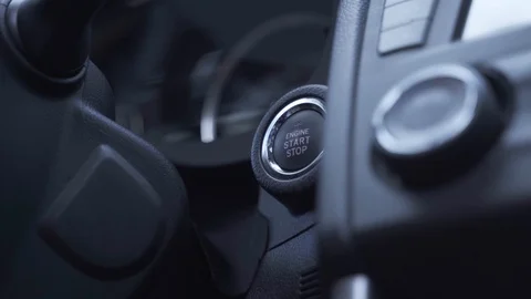 Man presses engine start button speedometer illuminates Stock Footage 116721248
