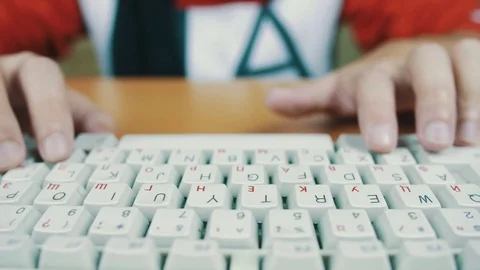 Man presses a hot key on a computer keyboard Stock Footage 70170397