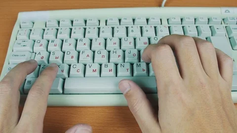 Man presses a hot key on a computer keyboard Stock Footage 70170796