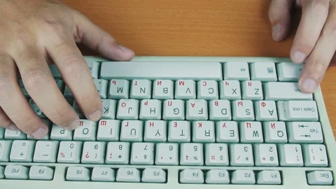 Man presses on the keyboard hotkeys Stock Footage 70170089