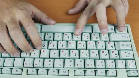 Man presses on the keyboard hotkeys Stock Footage 70170197
