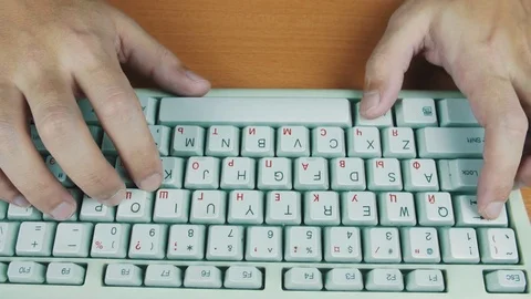 Man presses on the keyboard hotkeys Stock Footage 70170750