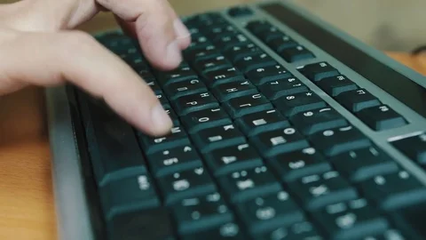 The man presses keys of the computer keyboard Stock Footage 70570185