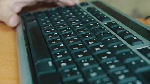 The man presses keys of the computer keyboard Stock Footage 70571551