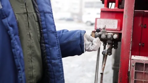 The man presses the lever Stock Footage 82054704