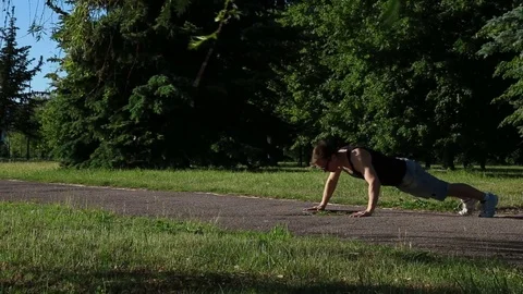 The man presses in the park 스톡 동영상 76820297