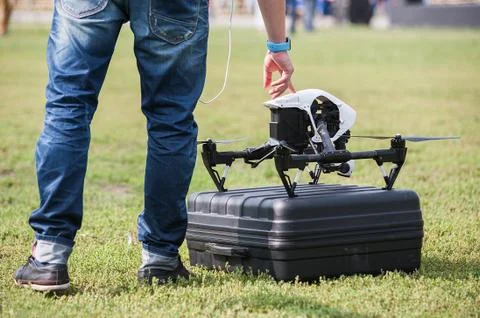 Man presses start button on drone Stock-Fotos