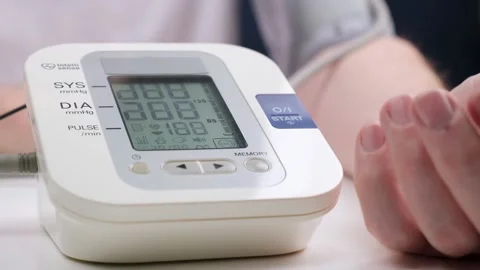 The man presses the start button on the tonometer. slow motion. close-up. Stock Footage 179343635