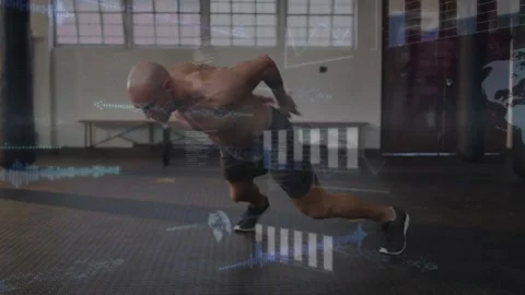 Man pressing up and rotating push-ups on rubber floor, fitness data overlays 動画素材 330621675