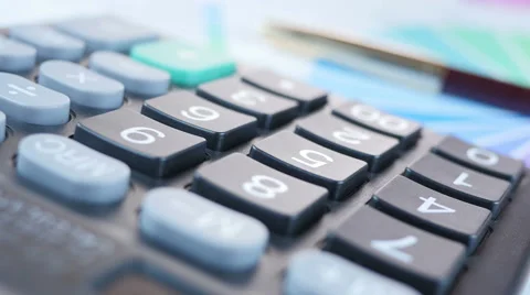 Man pressing buttons of Calculator Stock Footage 64058671