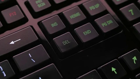 Man pressing DEL key on computer keyboard 스톡 동영상 85402552