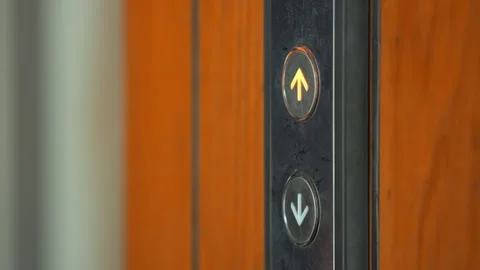 Man pressing elevator button in hotel or modern office building 4K slowmotion Video stock 249687527