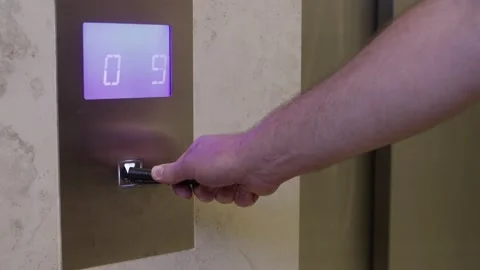 Man is pressing elevator's button with pen Video stock 140532958