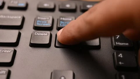 Man Pressing End Key on Keyboard to Jump to Line End on Computer Stock Footage 333572413