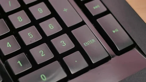 Man pressing enter key on computer keyboard Stock-Footage 85402480