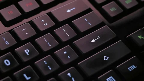 Man pressing enter key on computer keyboard Stock Footage 85402612