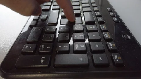 Man pressing the Enter key in a keyboard Stock Footage 116266250
