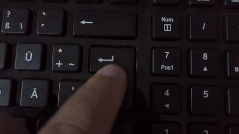 Man pressing the Enter key in a keyboard Stock Footage 116266255
