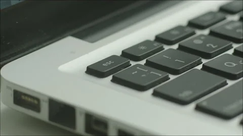 Man Pressing Escape Button on Laptop Stock Footage 60383032