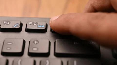 Man Pressing F11 Key on Computer Keyboard to Enter Full Screen Mode Stock Footage 333550762