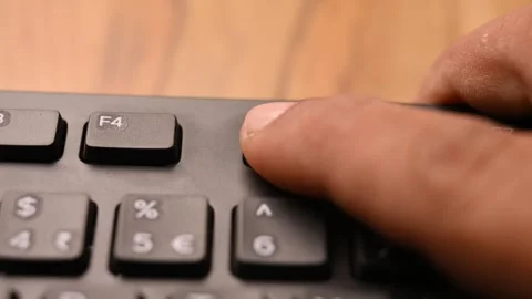 Man Pressing F5 Key on Keyboard to Refresh Web Page on Computer Stock Footage 333568952