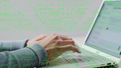 Man pressing keys and coding on laptop for work, green numeric overlay shifting Stock Footage 335465899