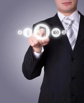 Man pressing media player button 스톡 사진