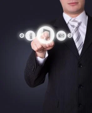 Man pressing media player button 스톡 사진