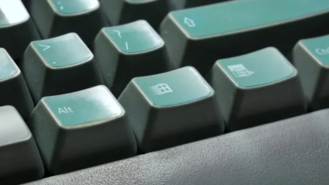 Man pressing the Microsoft Windows 95 98 2000 logo symbol icon, OS key Stock Footage 167374675