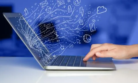 Man pressing notebook laptop computer with doodle icon cloud symbols Stock Photos