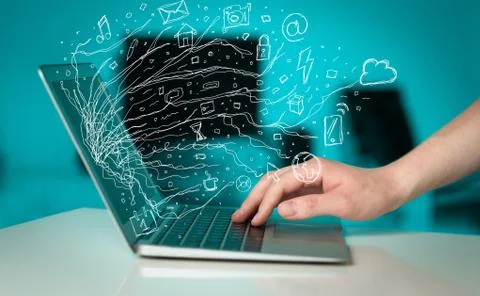 Man pressing notebook laptop computer with doodle icon cloud symbols Stock Photos