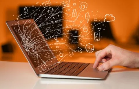 Man pressing notebook laptop computer with doodle icon cloud symbols Stock Photos