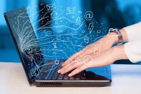 Man pressing notebook laptop computer with doodle icon cloud symbols Stock Photos