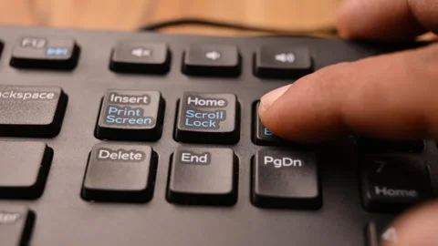 Man Pressing Page Up Key on Keyboard to Scroll Up Document on Computer Stock Footage 333576286