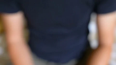 Man pressing the remote control of TV Stock Footage 81060645