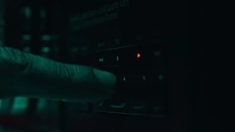 Man pressing stop button on retro tape machine in studio closeup. Index touching Video stock 332674794