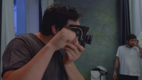 Man pretends making video with old fahioned camera Video stock 94648647