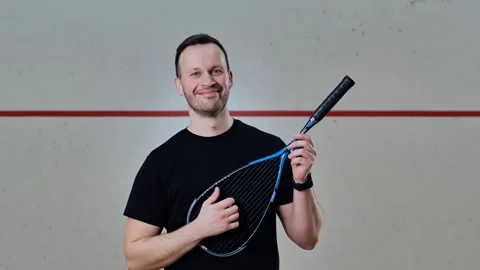 Man Pretends to Play Guitar With Squash Racket – Funny Slow Motion Court Scene Stock Footage 313476515