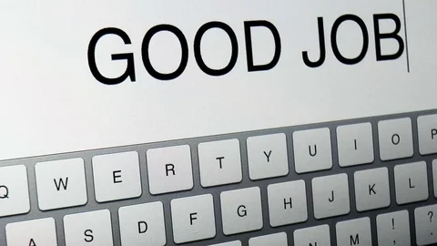 Man prints on the graphic tablet the words Good job Stock Footage 79099894