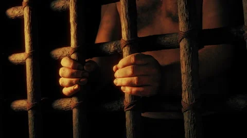 Man In Prison In Golden Light Stock Footage 309570483