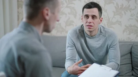 Man with problems at a psychologist Stock Footage 149027584